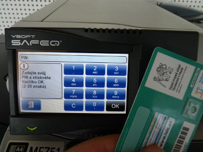 Pic. 1: Print terminal you could switch to English by left bottom button with a picture of globe. To authorize attach your customer card